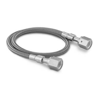 Mangueira com Núcleo em PTFE Liso Série TH. Com malha externa trançada em Aço inoxidável 304. Diâmetro nominal de 1/4". Pressão de trabalho de 3000 psig (206 bar). Pressão de ruptura de 12000 psig (826 bar) a 20 °C. Extremidades em Aço Inoxidável 316